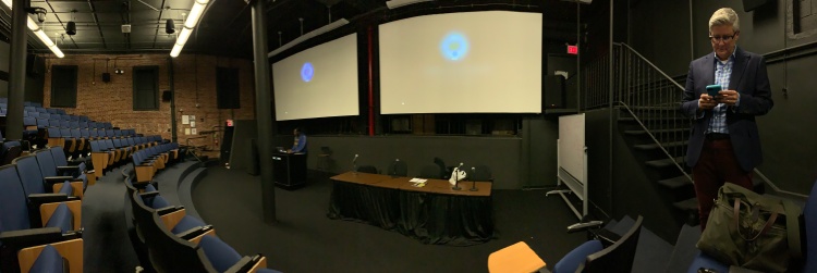 Panoramic photo of Paige before delivering keynote